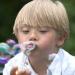 Boy blowing bubble
