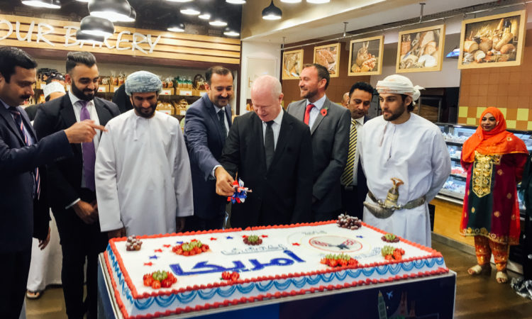 Cake-cutting ceremony at LuLu's Discover America Week.