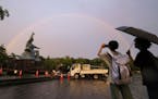 A rainbow appears in the sky over Peace Park in Nagasaki, Japan, on Aug. 8, 2023, a day before the 78th anniversary of the U.S. atomic bombing of the 