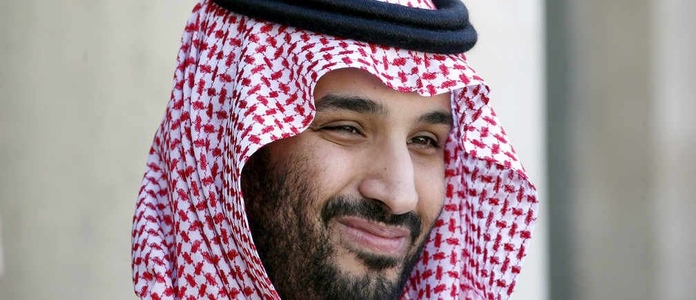 Saudi Arabia's Deputy Crown Prince Mohammed bin Salman reacts upon his arrival at the Elysee Palace in Paris, France, June 24, 2015. 