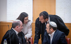 Head of Rosh Yehudi, Israel Zeira, bottom right, attends a hearing on Tel Aviv Simhat Torah celebrations at the Supreme Court in Jerusalem on October 6, 2023 (Chaim Goldbergl/Flash90)
