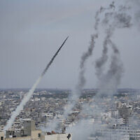 Rockets are launched by Palestinian terror groups from the Gaza Strip towards Israel, in Gaza, October 7, 2023. (AP Photo/Hatem Moussa)