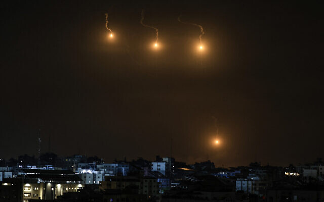 Flares are used by the Israeli army over the Gaza Strip on October 7, 2023, following an attack by Hamas terrorists inside Israel. (Mahmud Hams/AFP)