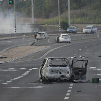 A car destroyed in an attack by Palestinian terrorists is seen in Sderot, Israel, October 7, 2023. (Ohad Zwigenberg/AP)