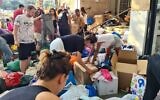 A clothing and equipment drive on King David Blvd in Tel Aviv for residents in the south and soldiers, on October 8, 2023. (Lizzy Shaanan/Courtesy)