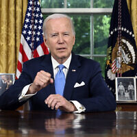US President Joe Biden addresses the nation on the budget deal that lifts the federal debt limit and averts a US government default, from the Oval Office of the White House in Washington, Friday, June 2, 2023. (Jim Watson/Pool via AP)