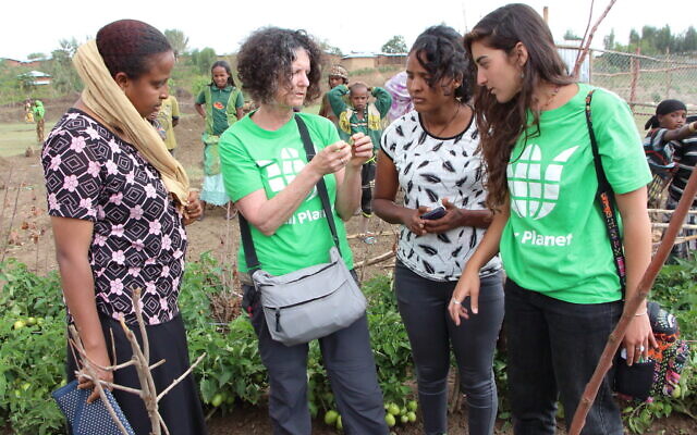 Shoshan Haran with members of the Fair Planet NGO corps of  volunteers and staff in Ethiopia. (Aviv Havron)