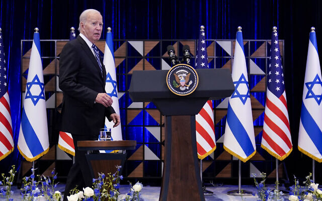 US President Joe Biden walks to the podium to deliver remarks on the war between Israel and Hamas, Oct. 18, 2023, in Tel Aviv. (AP Photo/Evan Vucci)