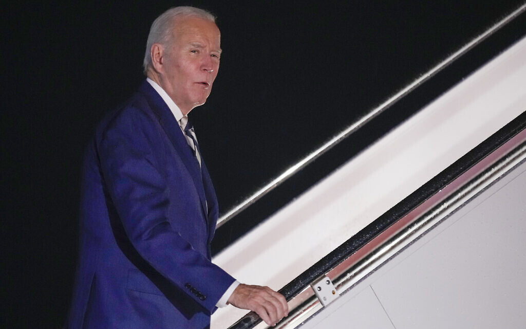 US President Joe Biden answers a questions as he boards Air Force One at Andrews Air Force Base, Maryland, October 20, 2023, to travel to Rehoboth Beach, Delaware. (AP Photo/Andrew Harnik)