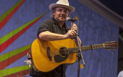 Jeff Tweedy performs with Wilco at the New Orleans Jazz & Heritage Festival, in New Orleans, April 24, 2015. (Photo by Barry Brecheisen/Invision/AP, File)