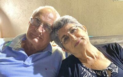 This handout photo provided by Anat Moshe Shoshany/Elinor Shahar Personal Management shows David Moshe and his wife Adina Moshe in an unknown location. (Anat Moshe Shoshany/Elinor Shahar Personal Management via AP)