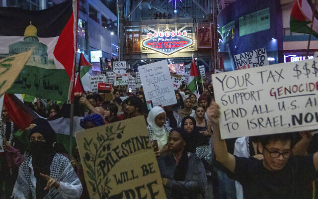 Pro-Palestinian protesters march and denounce Israel in Las Vegas, Tuesday, Oct. 17, 2023 (AP Photo/ Ty ONeil)