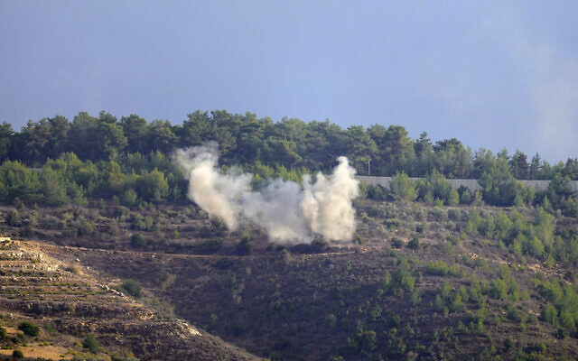 Smoke rises after a shelling in Bustan, a Lebanese border village with Israel, south Lebanon, Oct. 19, 2023. (AP Photo/Hassan Ammar)