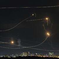 Israeli Iron Dome air defense system fires to intercept a rocket fired from the Gaza Strip, in Ashkelon, October 20, 2023. (AP Photo/Avi Roccah)