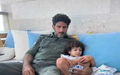 Actor Tsahi Halevi and his young son as the 'Fauda' actor returns to reserve duty for the 2023 Gaza-Israel war (Courtesy Lucy Aharish Instagram stories)