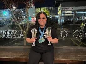 New Zealand’s champion arm wrestler keeps promise to her dad