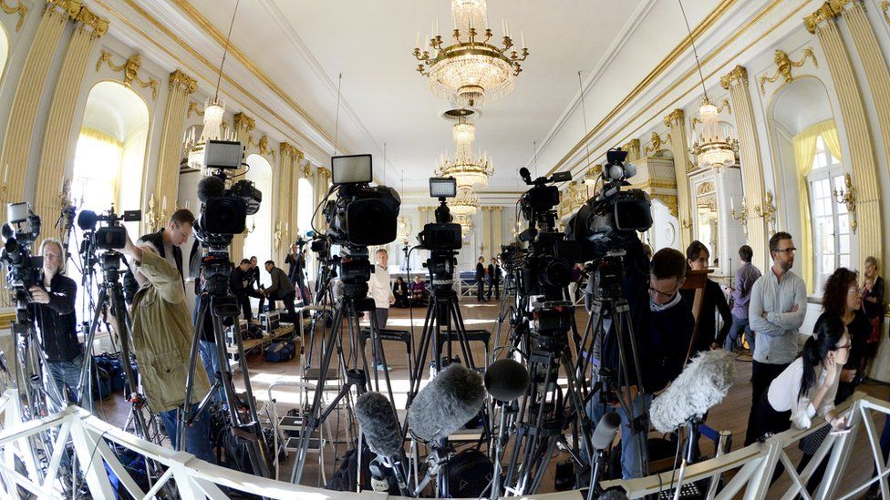TV cameras covering a Nobel prize announcement at the Swedish Academy