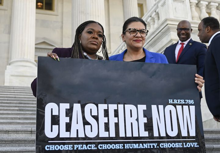 Reps. Cori Bush (D-Mo.) and Rashida Tlaib (D-Mich.) hold a banner demanding a cease-fire and condemning the Israeli attacks on Gaza in front of the U.S. Capitol in Washington, D.C., on Nov. 8.