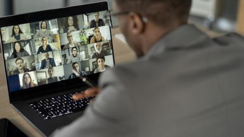 Man on a video call on his laptop