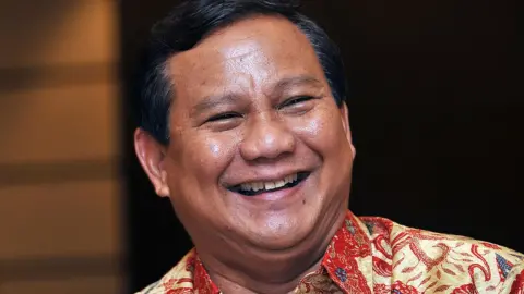 Prabowo Subianto an Indonesian presidential candidate representing the Gerindra party smiles during a luncheon with foreign reporters at a hotel in Jakarta on February 20, 2009.