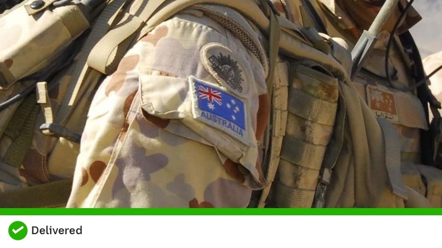 The shoulder of a man wearing an ADF camouflage uniform withAustralian flag patch