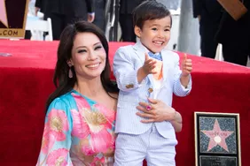Lucy Liu is joined by her son Rockwell Lloyd as she receives her star on the Walk of Fame during a ceremony in Hollywood on May 1, 2019.