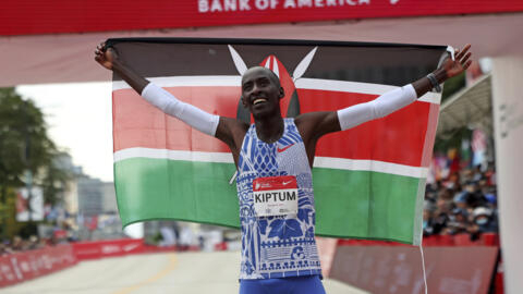 Kelvin Kiptum of Kenya celebrates his Chicago Marathon world record victory in Chicago's Grant Park on Sunday, Oct. 8, 2023. 