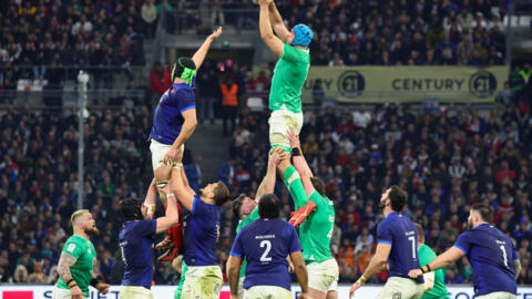 Ireland's Tadhg Beirne (CR) catches the ball during the Six Nations opener against France at the Stade Velodrome in Marseille