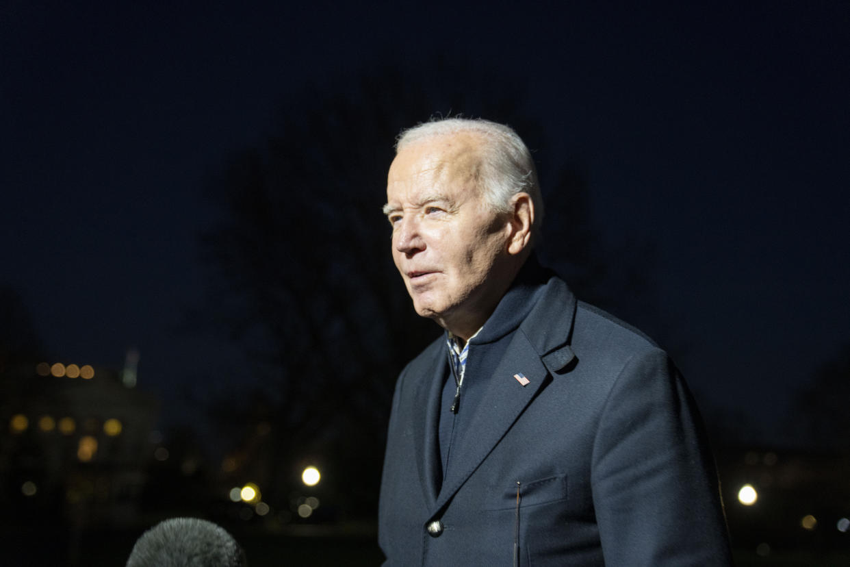 President Biden answers a reporter's question as he arrives at the White House.