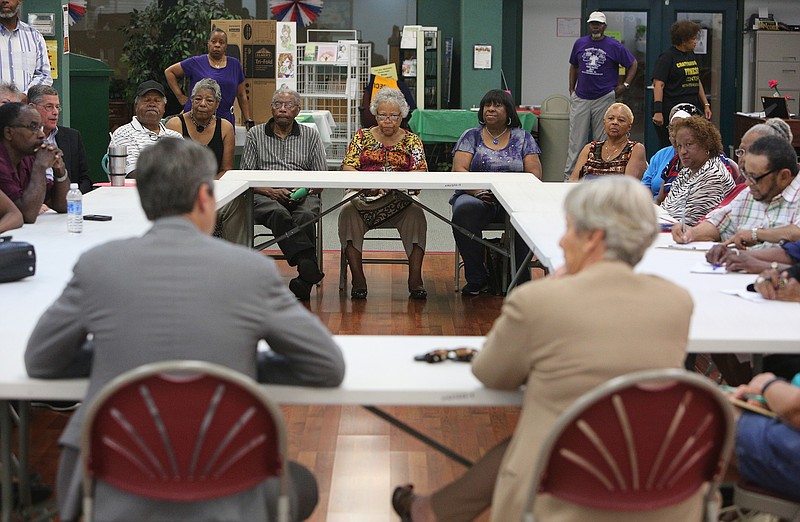 A group of seniors attend a roundtable over taxes in this file photo. The Hall income tax is being phased out with the rate at just 2 percent this year.