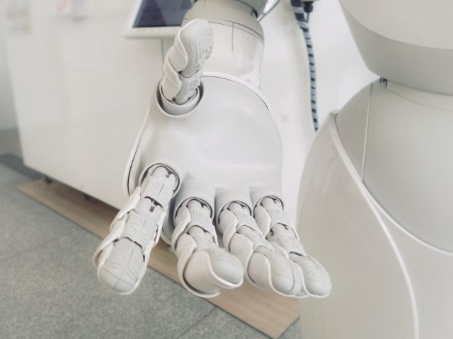 A robot holding out a hand