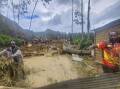 The landslide in PNG has buried hundreds of people and at least 1100 houses, DFAT says. (AP PHOTO)