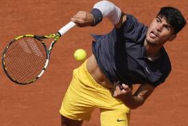 Carlos Alcaraz on his way to an impressive opening victory over American JJ Wolf at the French Open. (AP PHOTO)