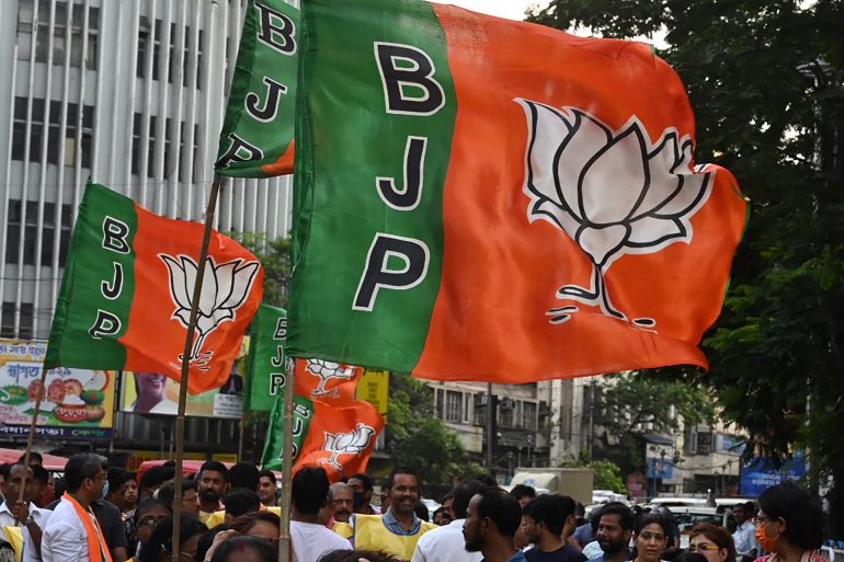 Bhartiya Janata Party (BJP) flags [Dibyangshu Sarkar/AFP]