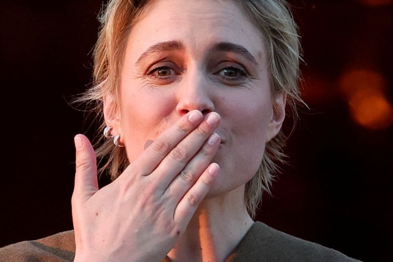 Jury President of the 77th Cannes Film Festival Greta Gerwig reacts on a balcony at the Hotel Martinez on the eve of the opening of the 77th Cannes Film Festival in Cannes, France, May 13, 2024. REUTERS/Stephane Mahe