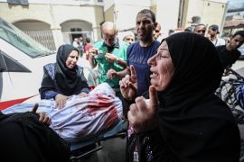 A woman mourns as the bodies of Palestinians killed in Israeli attacks on Jabalia and Beit Lahiya are brought to al-Ahli Arab Hospital in Gaza City, on May 22, 2024 [Dawoud Abo Alkas/Anadolu Agency]