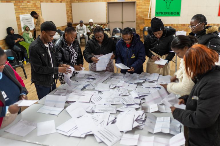 Election volunteers count ballots at Craighall Park Elementary school in Johannesburg