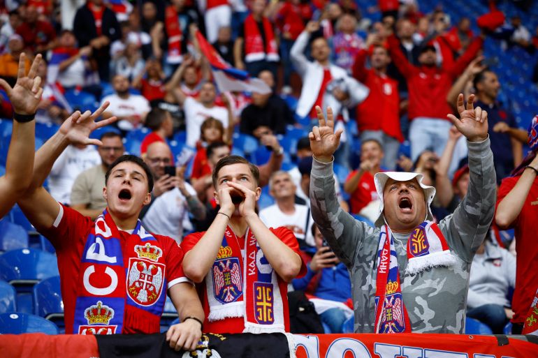 Serbia fans chant inside the stadium