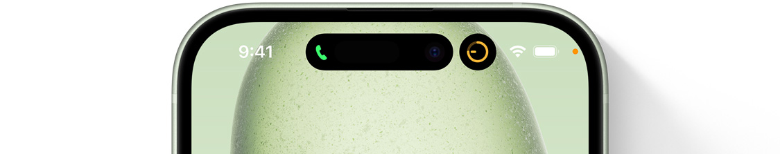 iPhone 15 s Dynamic Islandem rozděleným na dvě bubliny.