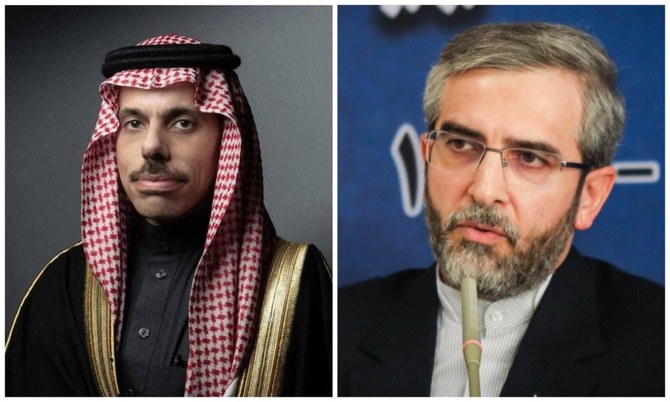 Saudi Arabia’s Prince Faisal speaks with Iranian acting foreign minister Ali Bagheri Kani
