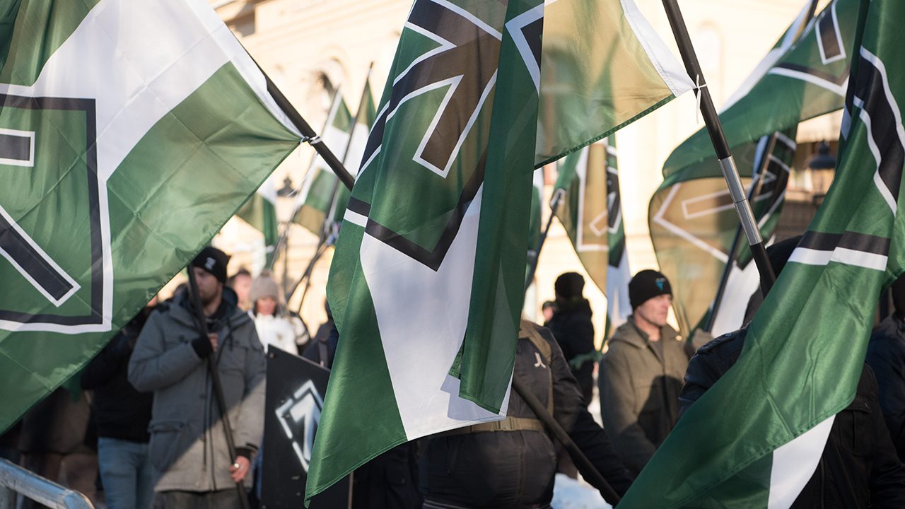 Green and white: the colours of the Nordic Resistance Movment, here at a demonstration in Stockholm