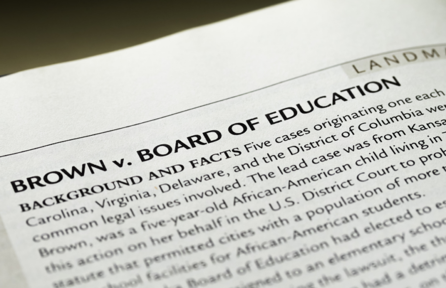 A photo of a textbook with an entry on Brown v. Board of Education.