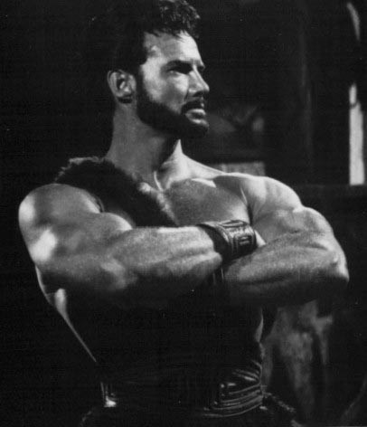 Steve Reeves strikes the Joe Weider pose Goliath and the Barbarians