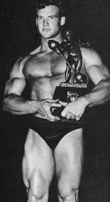 Steve Reeves with Sandow Trophy after winning contest