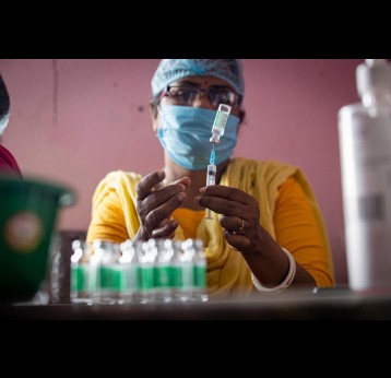 Nurses prepare Covishield Vaccinations to be given to Locals in the Sunderbarn / India. Credit: Gavi/2022/Benedikt v.Loebell