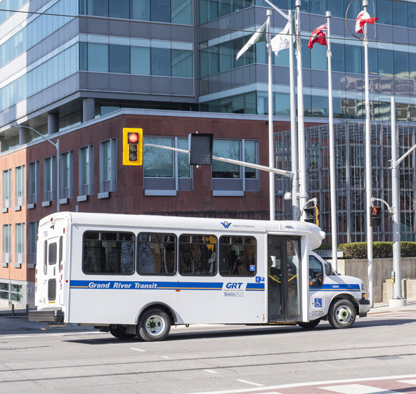 MobilityPLUS vehicle passing Kitchener City Hall