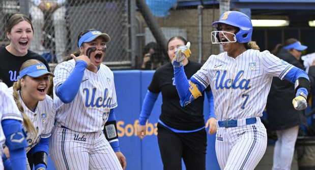 UCLA’s Maya Brady, right, celebrates her first-inning home run during an 8-0 Game 1 victory over Georgia in their NCAA Super Regional game last week at Easton Stadium. (Photo by John McCoy, Contributing Photographer)
