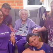 Myrtle celebrates 100th birthday with family reunion and football gifts