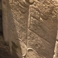 Detail of petroglyphs on back of RR-001-156 revealed through excavation. © EISP 2011