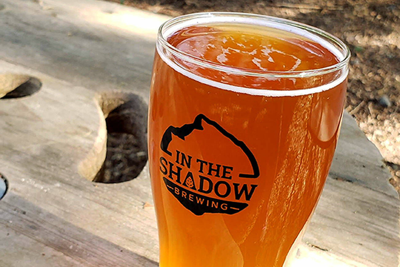 A pint of In the Shadows’ HBL — Honey Basil Lemon — blonde ale, which took home a bronze medal in the 2022 Washington Beer Awards. (Aaron Swaney)